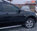 Чорний Міцубісі Аутлендер, об'ємом двигуна 2 л та пробігом 271 тис. км за 6940 $, фото 10 на Automoto.ua