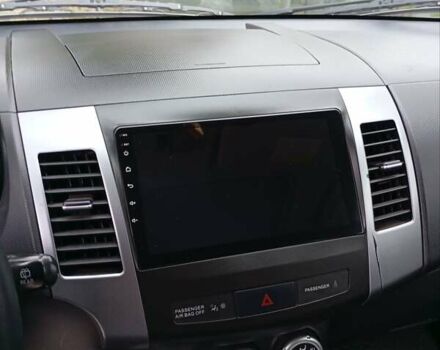 Чорний Міцубісі Аутлендер, об'ємом двигуна 2.36 л та пробігом 265 тис. км за 8800 $, фото 8 на Automoto.ua