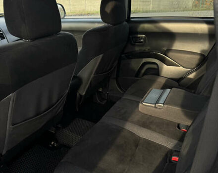 Чорний Міцубісі Аутлендер, об'ємом двигуна 2.36 л та пробігом 293 тис. км за 7900 $, фото 12 на Automoto.ua