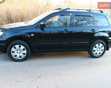 Черный Мицубиси Аутлендер, объемом двигателя 2 л и пробегом 189 тыс. км за 7200 $, фото 34 на Automoto.ua