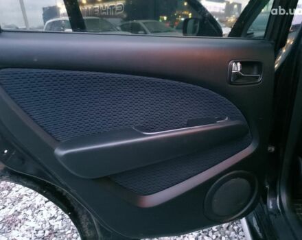 Черный Мицубиси Аутлендер, объемом двигателя 2 л и пробегом 271 тыс. км за 6940 $, фото 16 на Automoto.ua