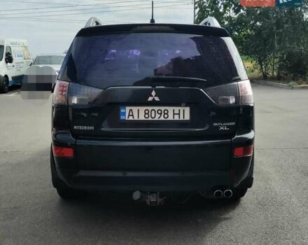 Черный Мицубиси Аутлендер, объемом двигателя 3 л и пробегом 317 тыс. км за 8900 $, фото 5 на Automoto.ua