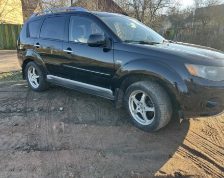 Черный Мицубиси Аутлендер, объемом двигателя 2 л и пробегом 247 тыс. км за 4600 $, фото 4 на Automoto.ua