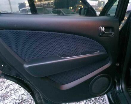 Черный Мицубиси Аутлендер, объемом двигателя 2 л и пробегом 271 тыс. км за 6940 $, фото 16 на Automoto.ua