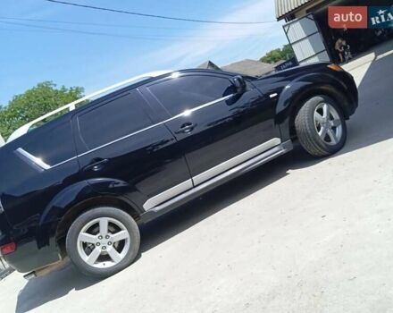 Черный Мицубиси Аутлендер, объемом двигателя 2.36 л и пробегом 203 тыс. км за 9200 $, фото 5 на Automoto.ua