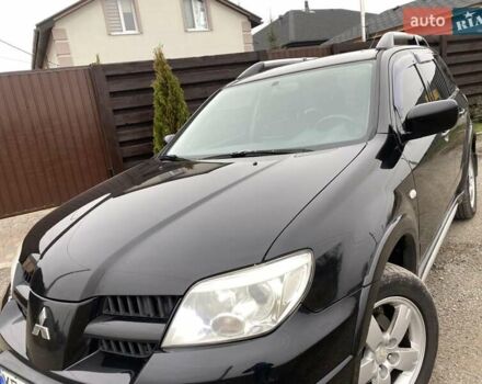 Черный Мицубиси Аутлендер, объемом двигателя 2.4 л и пробегом 178 тыс. км за 6900 $, фото 11 на Automoto.ua
