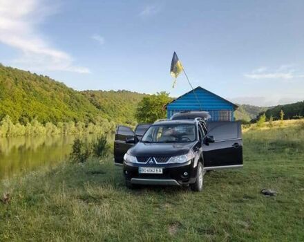 Черный Мицубиси Аутлендер, объемом двигателя 2.36 л и пробегом 203 тыс. км за 9200 $, фото 3 на Automoto.ua