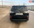 Черный Мицубиси Аутлендер, объемом двигателя 2.4 л и пробегом 290 тыс. км за 8600 $, фото 5 на Automoto.ua