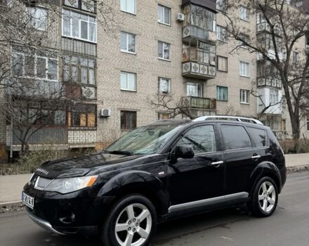 Черный Мицубиси Аутлендер, объемом двигателя 2 л и пробегом 377 тыс. км за 5200 $, фото 1 на Automoto.ua