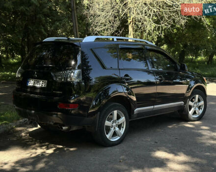 Черный Мицубиси Аутлендер, объемом двигателя 1.97 л и пробегом 265 тыс. км за 9600 $, фото 5 на Automoto.ua