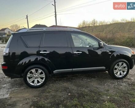 Черный Мицубиси Аутлендер, объемом двигателя 2.2 л и пробегом 310 тыс. км за 9700 $, фото 7 на Automoto.ua