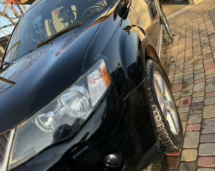 Черный Мицубиси Аутлендер, объемом двигателя 2.36 л и пробегом 253 тыс. км за 9600 $, фото 7 на Automoto.ua