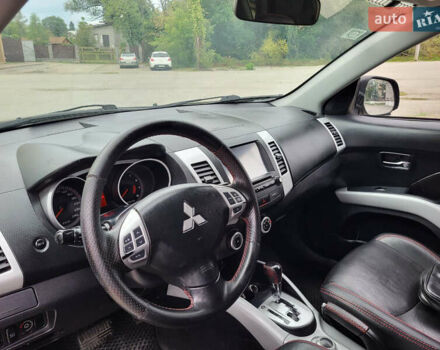 Чорний Міцубісі Аутлендер, об'ємом двигуна 2.4 л та пробігом 205 тис. км за 8400 $, фото 22 на Automoto.ua