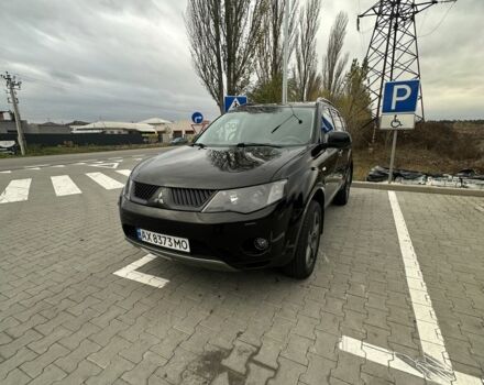 Чорний Міцубісі Аутлендер, об'ємом двигуна 2.4 л та пробігом 218 тис. км за 10000 $, фото 11 на Automoto.ua