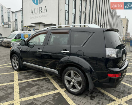 Черный Мицубиси Аутлендер, объемом двигателя 2.36 л и пробегом 120 тыс. км за 10100 $, фото 7 на Automoto.ua