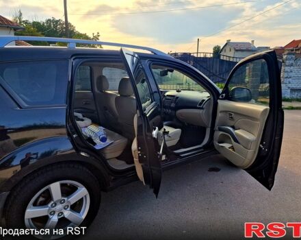 Черный Мицубиси Аутлендер, объемом двигателя 2.4 л и пробегом 189 тыс. км за 7000 $, фото 3 на Automoto.ua