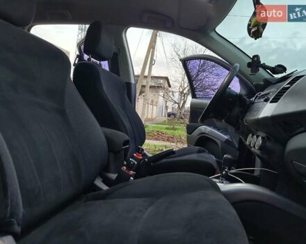 Черный Мицубиси Аутлендер, объемом двигателя 2.36 л и пробегом 192 тыс. км за 8800 $, фото 8 на Automoto.ua