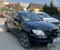 Чорний Міцубісі Аутлендер, об'ємом двигуна 2 л та пробігом 180 тис. км за 7300 $, фото 8 на Automoto.ua