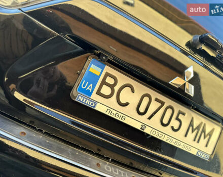 Черный Мицубиси Аутлендер, объемом двигателя 2.36 л и пробегом 253 тыс. км за 9600 $, фото 13 на Automoto.ua