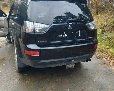 Черный Мицубиси Аутлендер, объемом двигателя 2 л и пробегом 242 тыс. км за 5500 $, фото 2 на Automoto.ua