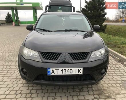 Чорний Міцубісі Аутлендер, об'ємом двигуна 2.4 л та пробігом 199 тис. км за 8999 $, фото 4 на Automoto.ua