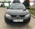 Чорний Міцубісі Аутлендер, об'ємом двигуна 2.4 л та пробігом 199 тис. км за 8999 $, фото 4 на Automoto.ua