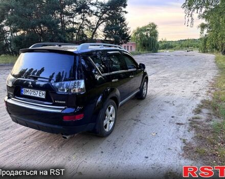 Черный Мицубиси Аутлендер, объемом двигателя 2.4 л и пробегом 208 тыс. км за 10200 $, фото 3 на Automoto.ua