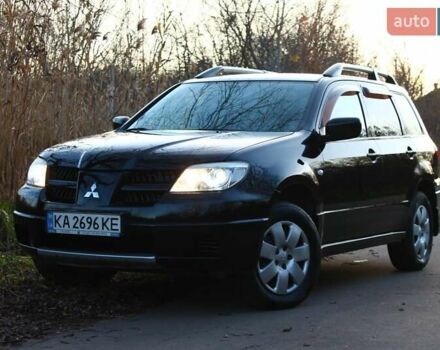 Черный Мицубиси Аутлендер, объемом двигателя 2 л и пробегом 189 тыс. км за 7200 $, фото 15 на Automoto.ua