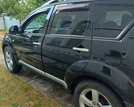 Чорний Міцубісі Аутлендер, об'ємом двигуна 3 л та пробігом 143 тис. км за 9500 $, фото 1 на Automoto.ua