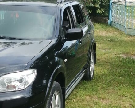 Чорний Міцубісі Аутлендер, об'ємом двигуна 2 л та пробігом 208 тис. км за 6700 $, фото 5 на Automoto.ua