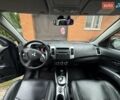 Черный Мицубиси Аутлендер, объемом двигателя 2.36 л и пробегом 259 тыс. км за 8500 $, фото 7 на Automoto.ua