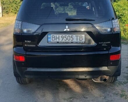 Чорний Міцубісі Аутлендер, об'ємом двигуна 2.4 л та пробігом 325 тис. км за 7500 $, фото 3 на Automoto.ua