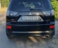 Чорний Міцубісі Аутлендер, об'ємом двигуна 2.4 л та пробігом 325 тис. км за 7500 $, фото 3 на Automoto.ua