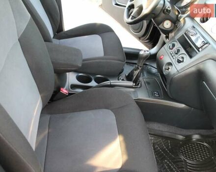 Черный Мицубиси Аутлендер, объемом двигателя 2 л и пробегом 190 тыс. км за 6900 $, фото 35 на Automoto.ua