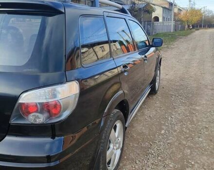Міцубісі Аутлендер 2008 у Івано-Франківську на Automoto.ua Чорний Міцубісі Аутлендер, об'ємом двигуна 2 л та пробігом 128 тис. км за 7000 $, фото 19 на Automoto.ua