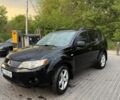 Черный Мицубиси Аутлендер, объемом двигателя 2.4 л и пробегом 369 тыс. км за 8500 $, фото 1 на Automoto.ua