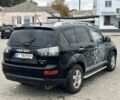 Міцубісі Аутлендер 2008 у Кременчуге на Automoto.ua Чорний Міцубісі Аутлендер, об'ємом двигуна 2.4 л та пробігом 230 тис. км за 6850 $, фото 4 на Automoto.ua