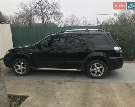 Чорний Міцубісі Аутлендер, об'ємом двигуна 2.38 л та пробігом 207 тис. км за 7000 $, фото 2 на Automoto.ua