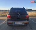 Черный Мицубиси Аутлендер, объемом двигателя 2 л и пробегом 190 тыс. км за 8000 $, фото 2 на Automoto.ua