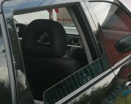 Чорний Міцубісі Аутлендер, об'ємом двигуна 2 л та пробігом 208 тис. км за 6700 $, фото 1 на Automoto.ua