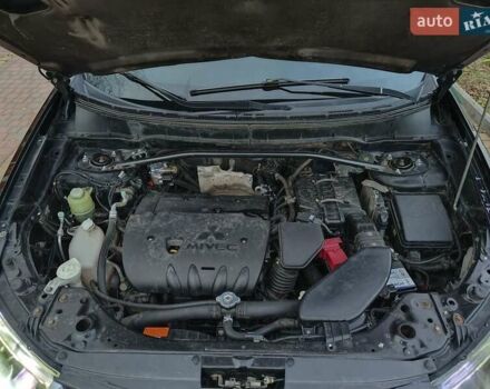 Черный Мицубиси Аутлендер, объемом двигателя 2.36 л и пробегом 192 тыс. км за 8800 $, фото 20 на Automoto.ua