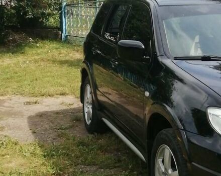 Чорний Міцубісі Аутлендер, об'ємом двигуна 2 л та пробігом 208 тис. км за 6700 $, фото 5 на Automoto.ua