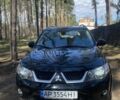 Черный Мицубиси Аутлендер, объемом двигателя 0 л и пробегом 227 тыс. км за 7400 $, фото 1 на Automoto.ua
