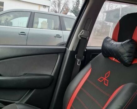 Черный Мицубиси Аутлендер, объемом двигателя 2 л и пробегом 212 тыс. км за 7900 $, фото 6 на Automoto.ua