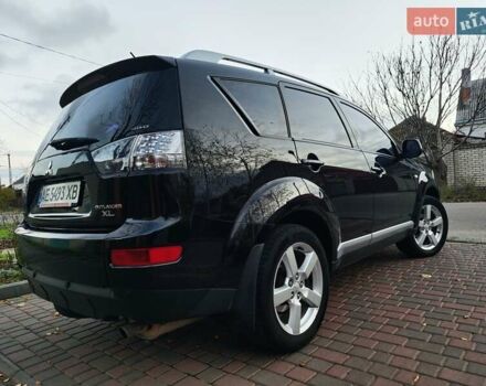 Черный Мицубиси Аутлендер, объемом двигателя 2.36 л и пробегом 192 тыс. км за 8800 $, фото 1 на Automoto.ua