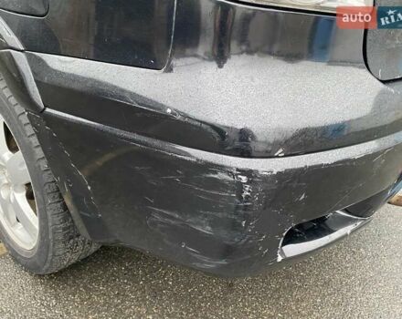 Черный Мицубиси Аутлендер, объемом двигателя 2 л и пробегом 306 тыс. км за 6500 $, фото 22 на Automoto.ua