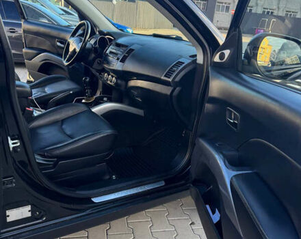 Черный Мицубиси Аутлендер, объемом двигателя 1.97 л и пробегом 202 тыс. км за 9700 $, фото 6 на Automoto.ua