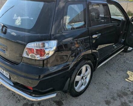 Черный Мицубиси Аутлендер, объемом двигателя 2 л и пробегом 189 тыс. км за 7100 $, фото 7 на Automoto.ua