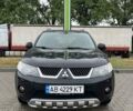 Черный Мицубиси Аутлендер, объемом двигателя 3 л и пробегом 200 тыс. км за 9200 $, фото 1 на Automoto.ua