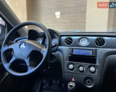 Черный Мицубиси Аутлендер, объемом двигателя 2 л и пробегом 270 тыс. км за 7199 $, фото 40 на Automoto.ua